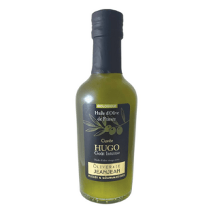 Dark glass bottle of organic olive oil cuvée "Hugo"