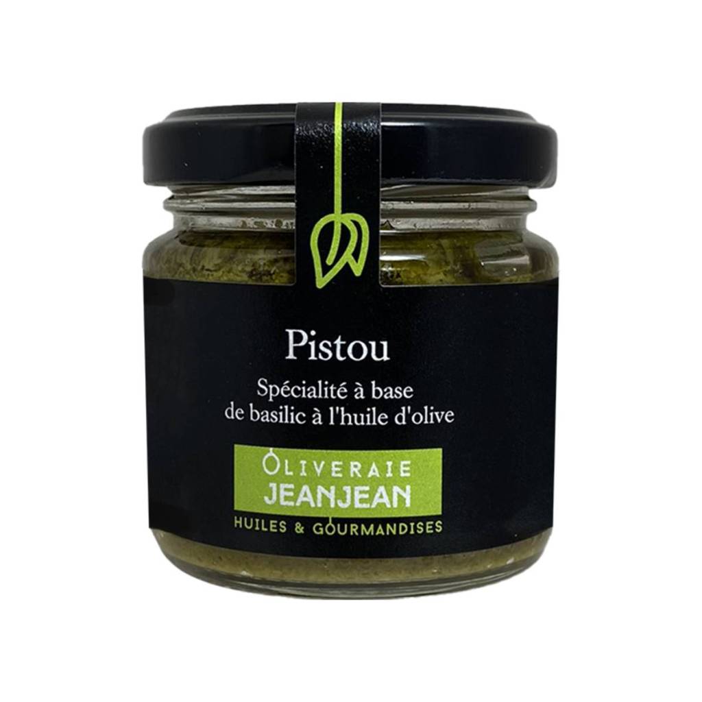 Glass jar of traditional Provençal pistou made with fresh basil and olive oil.
