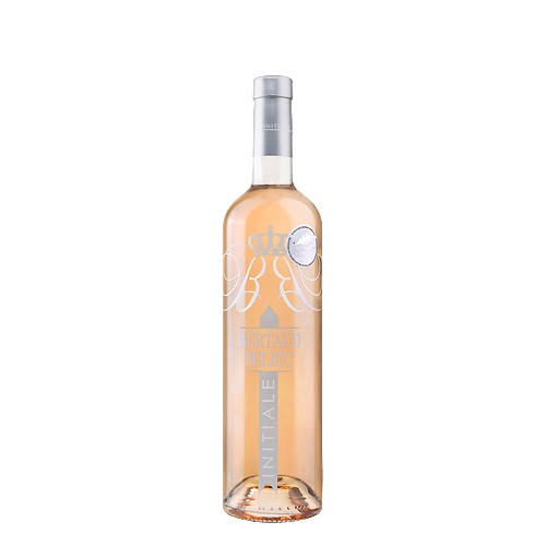 Bottle of Initiale Rosé, Provence AOP, salmon-colored wine with aromas of citrus, peach, and white flowers.